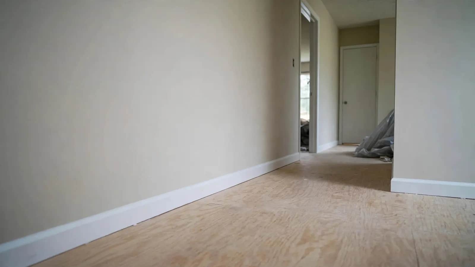 After: hallway with drywall cut out for drying, then rebuilt and painted